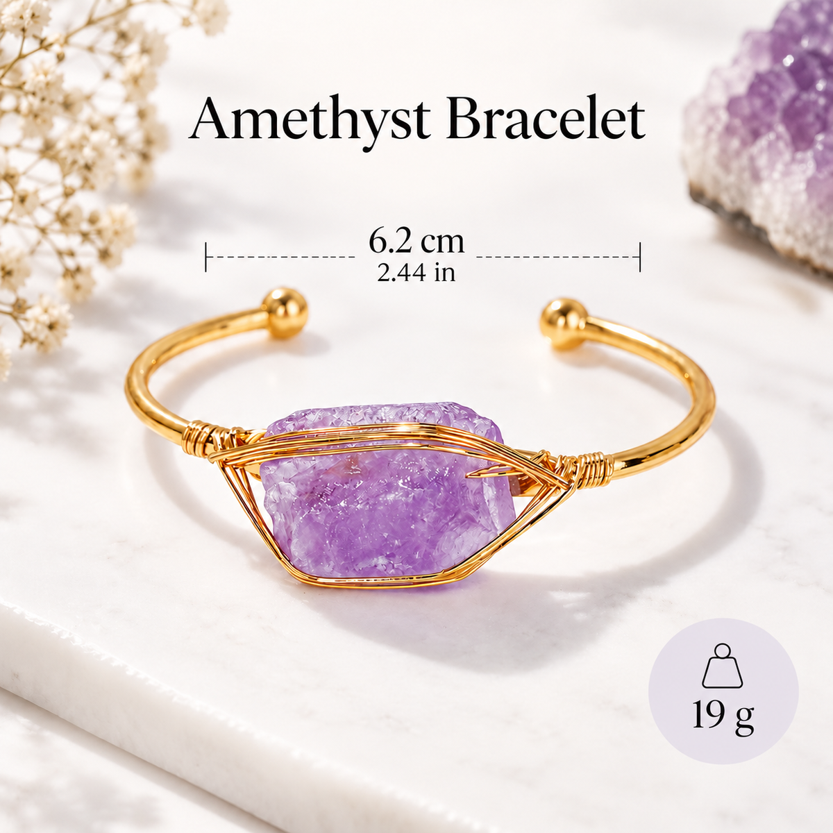Women’s gold cuff bangle featuring a raw purple amethyst stone wrapped in delicate gold wire on a 304 stainless steel bracelet.